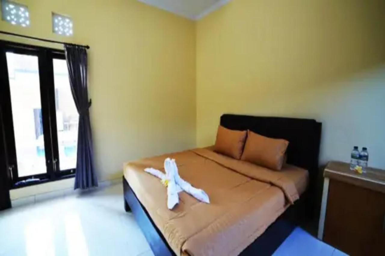 Oyo Flagship 91237 Ratu Guest House Kedunganan Eksteriør bilde
