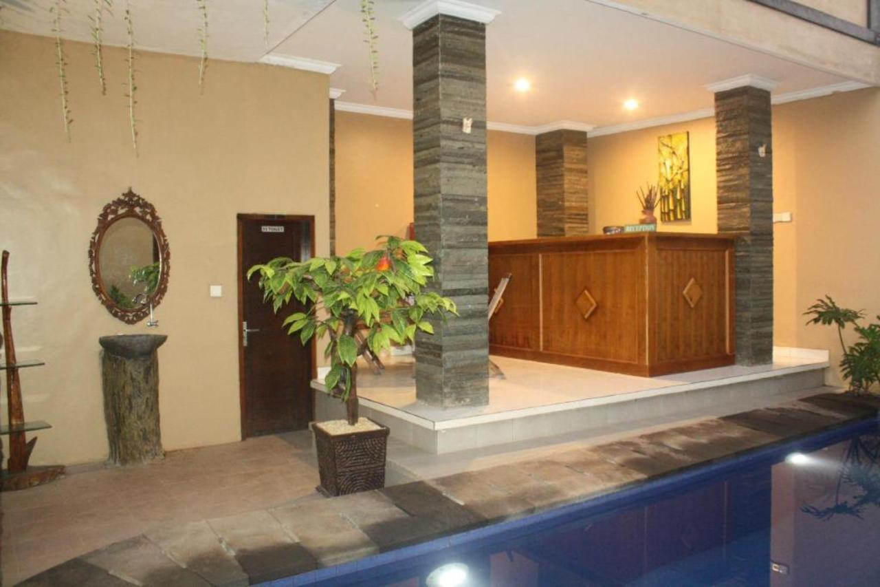 Oyo Flagship 91237 Ratu Guest House Kedunganan Eksteriør bilde