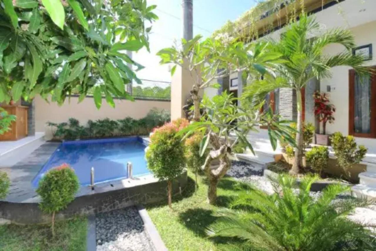 Oyo Flagship 91237 Ratu Guest House Kedunganan Eksteriør bilde