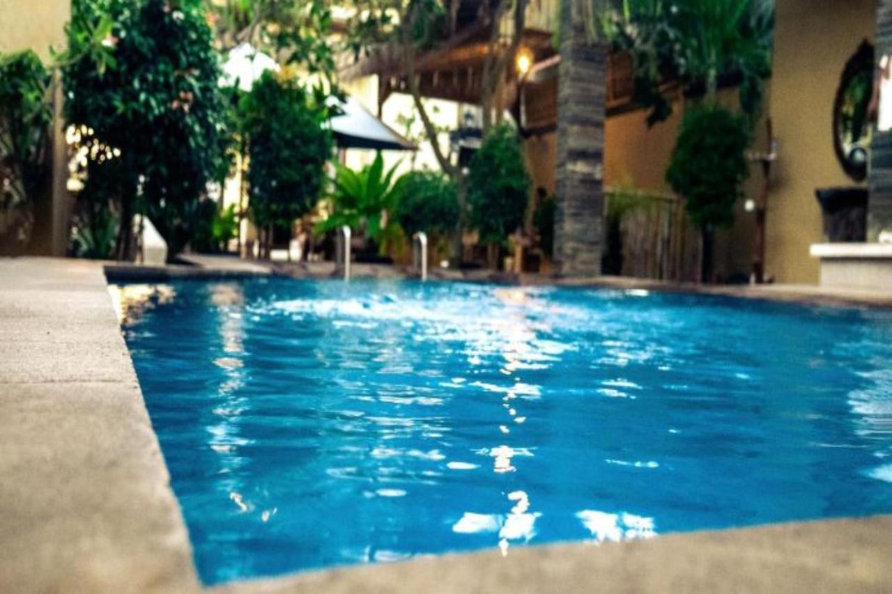 Oyo Flagship 91237 Ratu Guest House Kedunganan Eksteriør bilde
