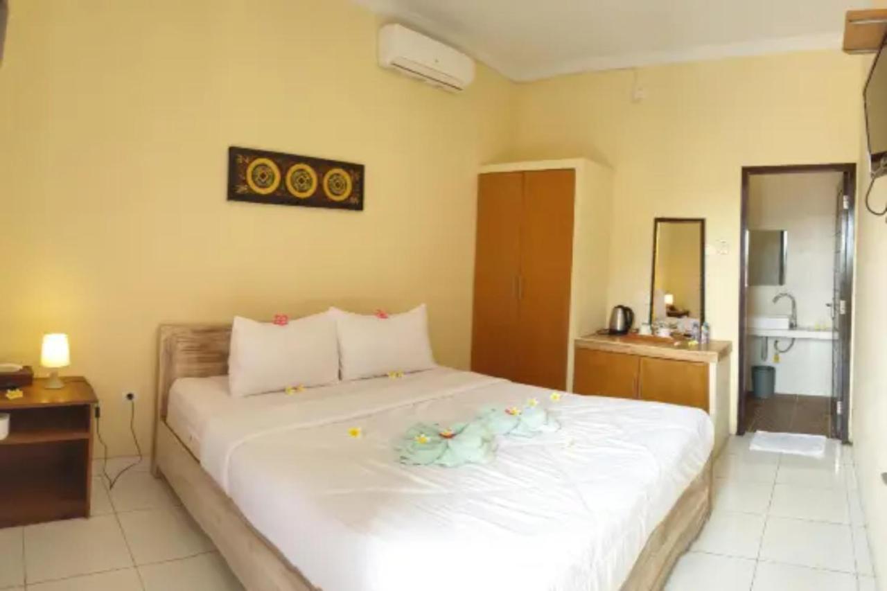 Oyo Flagship 91237 Ratu Guest House Kedunganan Eksteriør bilde