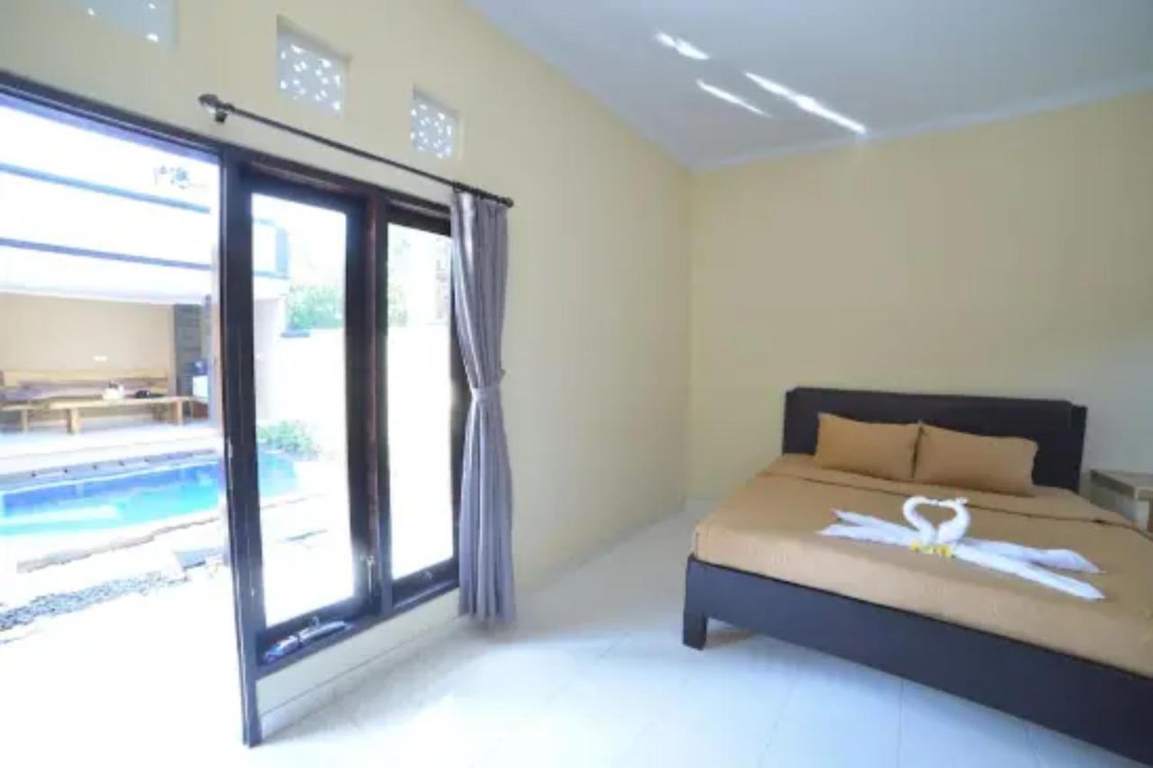 Oyo Flagship 91237 Ratu Guest House Kedunganan Eksteriør bilde
