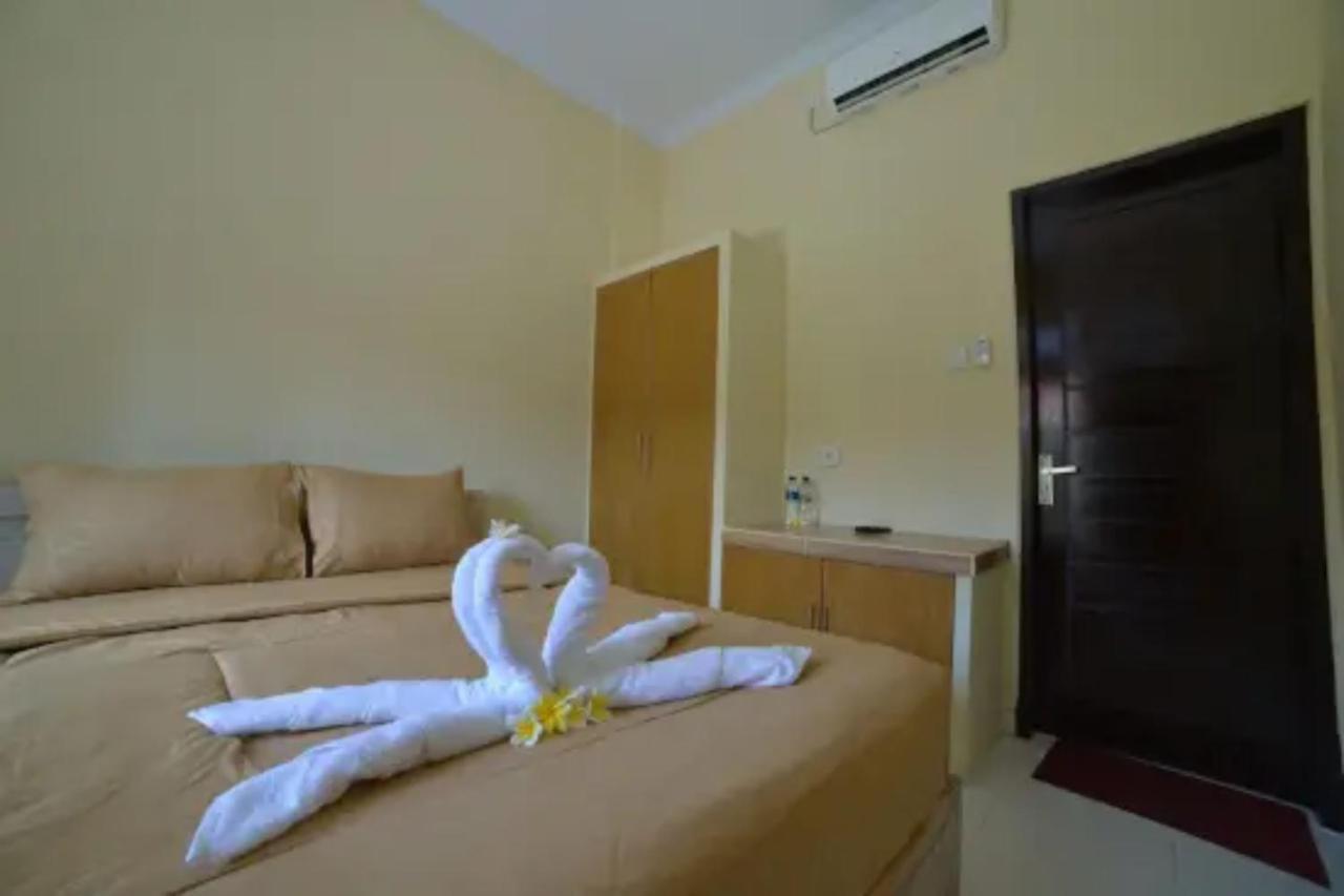 Oyo Flagship 91237 Ratu Guest House Kedunganan Eksteriør bilde