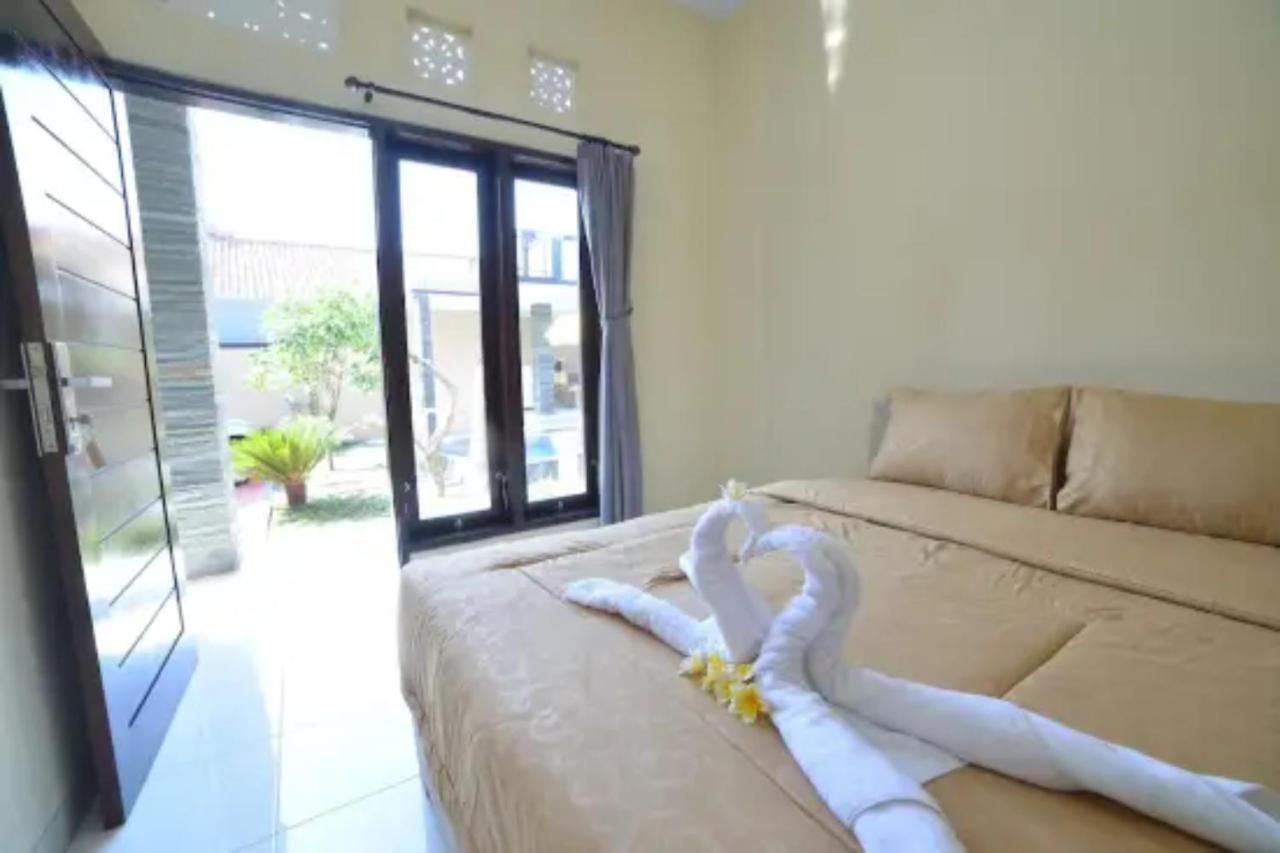 Oyo Flagship 91237 Ratu Guest House Kedunganan Eksteriør bilde