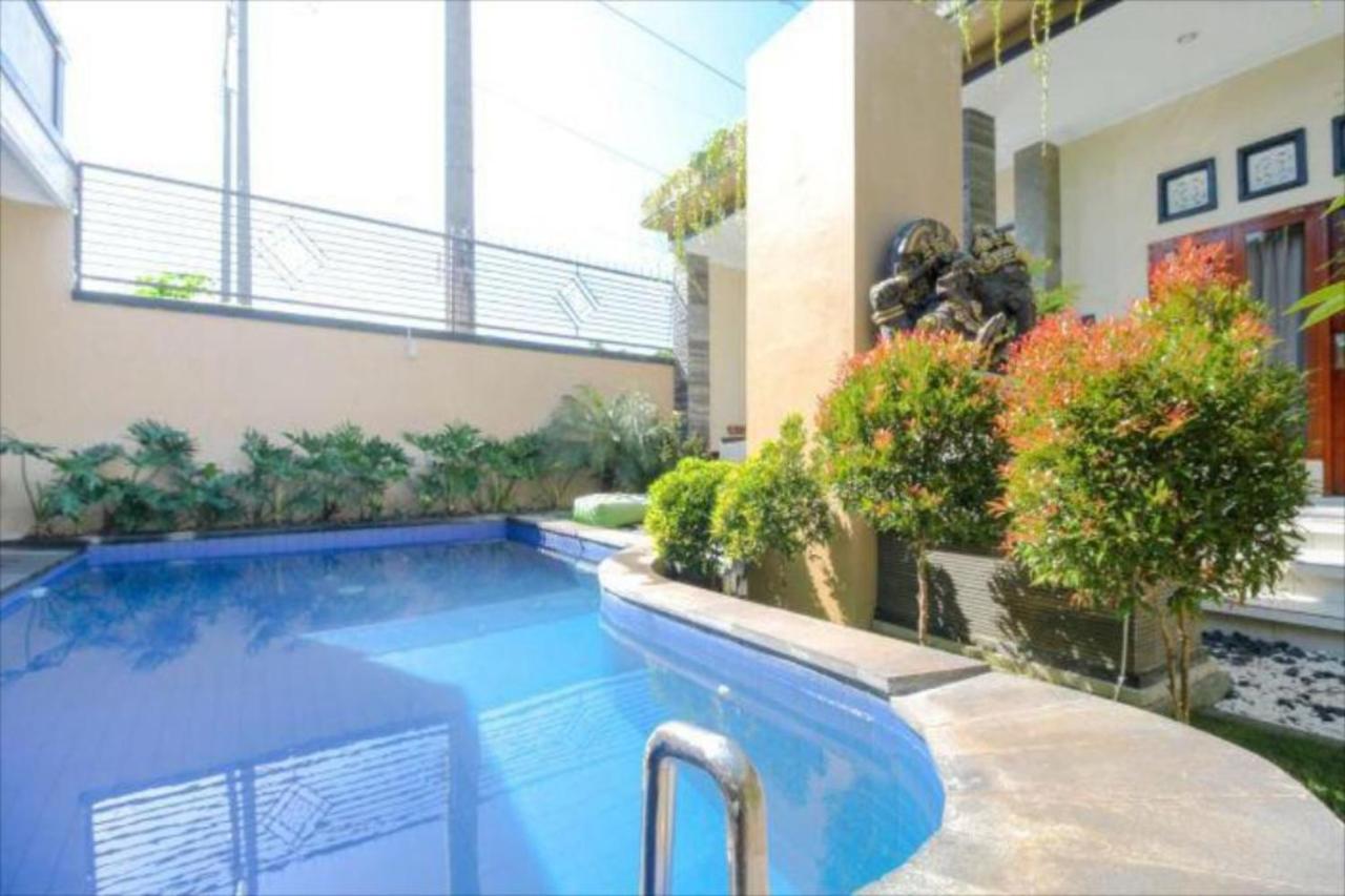 Oyo Flagship 91237 Ratu Guest House Kedunganan Eksteriør bilde